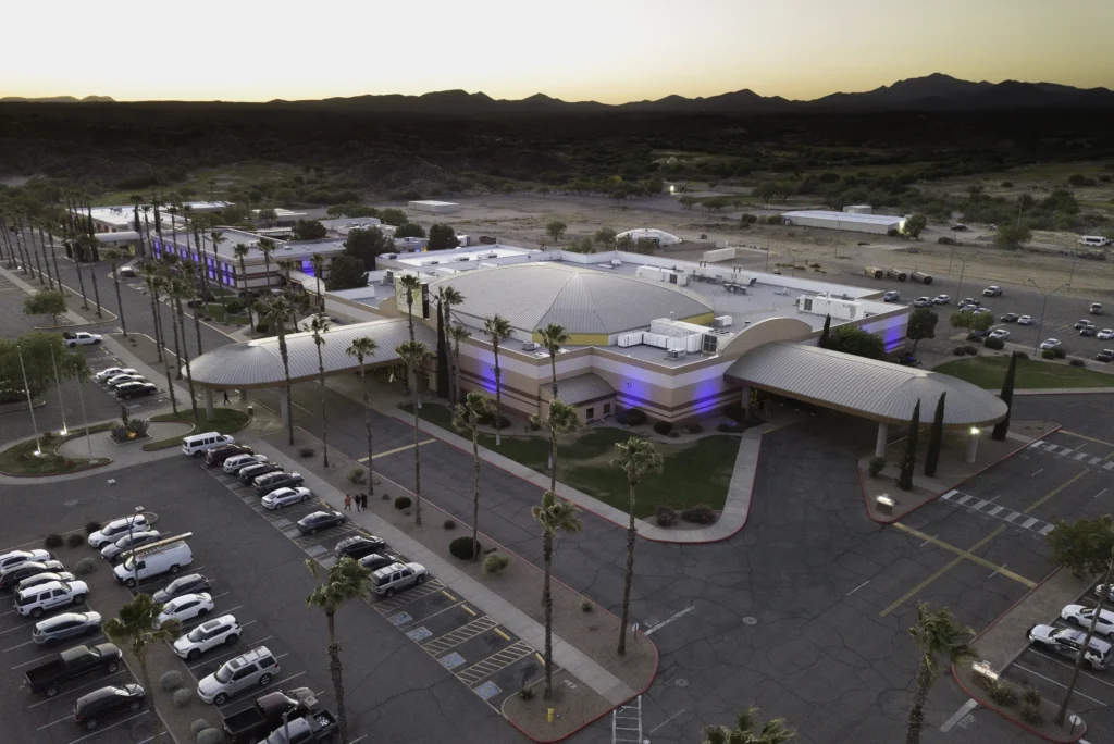 Apache Gold Casino aerial at dusk