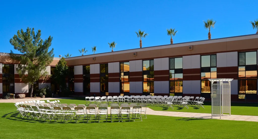 Courtyard with chairs for wedding.